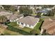 Aerial view of house and surrounding neighborhood at 526 Kingston Way, The Villages, FL 32162