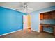 Bedroom with built-in desk and shelving unit at 526 Kingston Way, The Villages, FL 32162