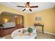 Bright and airy sunroom with a view into the living room at 526 Kingston Way, The Villages, FL 32162