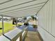 Covered carport area with access ramp at 534 Palo Verde Dr, Leesburg, FL 34748