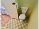 A close-up of a toilet in a bathroom with a sink and doorway visible at 534 Palo Verde Dr, Leesburg, FL 34748