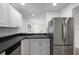 Modern kitchen featuring stainless steel appliances and white cabinets at 548 Cascade Cir # 100, Casselberry, FL 32707