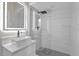 Modern bathroom with a walk-in shower and updated vanity at 5526 Parkdale Dr, Orlando, FL 32839