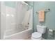 Clean bathroom with a shower/tub combo and updated fixtures at 6026 Landings Blvd, Lady Lake, FL 32159