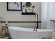 Bathroom features a modern soaking tub and fixtures at 6832 Maryland Ave, Groveland, FL 34736