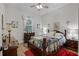 Spacious bedroom with wooden furniture and ceiling fan at 6832 Maryland Ave, Groveland, FL 34736