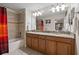 Bathroom with double vanity and granite countertops at 8955 Coco Palm Rd, Kissimmee, FL 34747