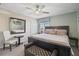 Bright bedroom with king-size bed and large mirror at 8955 Coco Palm Rd, Kissimmee, FL 34747