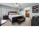 Spacious bedroom with king-size bed and ensuite bathroom access at 8955 Coco Palm Rd, Kissimmee, FL 34747