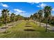 Palm trees line the entrance to this beautiful community at 8955 Coco Palm Rd, Kissimmee, FL 34747