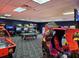 Community game room with arcade games and pool table at 8955 Coco Palm Rd, Kissimmee, FL 34747