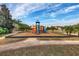 Modern playground with playset and wood-chip surface at 8955 Coco Palm Rd, Kissimmee, FL 34747