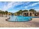 Large resort-style pool with waterfall feature and surrounding lounge area at 8955 Coco Palm Rd, Kissimmee, FL 34747