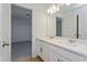 Double vanity bathroom with modern finishes at 1304 Silo Dr, St Cloud, FL 34771