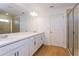 Bathroom with double vanity and a separate shower at 1304 Silo Dr, St Cloud, FL 34771