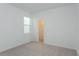 Bedroom with a large window and closet at 1304 Silo Dr, St Cloud, FL 34771