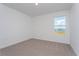 Bright bedroom with carpeting and a view at 1304 Silo Dr, St Cloud, FL 34771