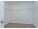 Walk-in closet with wire shelving at 1304 Silo Dr, St Cloud, FL 34771