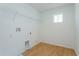 Laundry room with tile floor and shelving at 1304 Silo Dr, St Cloud, FL 34771