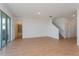 Living area with tile floors, sliding glass doors, and a view of the backyard at 1304 Silo Dr, St Cloud, FL 34771