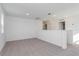 Spacious loft area with carpet and multiple doors at 1304 Silo Dr, St Cloud, FL 34771