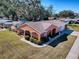 Charming single story home with landscaped yard at 1415 Park Ave, Tavares, FL 32778