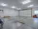 Large garage with ample space for workshop and vehicles at 1415 Park Ave, Tavares, FL 32778