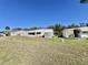Expansive backyard view highlighting the property's large lot at 149 Royal Palm Dr, Leesburg, FL 34748