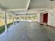 Spacious carport offering covered parking and easy access to the front door at 149 Royal Palm Dr, Leesburg, FL 34748
