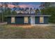 Charming single-story home with a newly landscaped front yard and a fresh exterior paint job at 15323 Sw 25Th Pl, Ocala, FL 34482