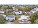 A cozy single-Gathering home with a screened-in porch, surrounded by mature trees in a quiet neighborhood at 1613 Cherry Hill Rd, The Villages, FL 32159