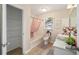 Bathroom with large closet, tub and shower, bright vanity with a marble top and vessel sink at 1613 Cherry Hill Rd, The Villages, FL 32159