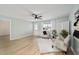 Bright living room with a decorative screen, modern decor, and plenty of natural light at 1613 Cherry Hill Rd, The Villages, FL 32159
