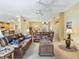 Spacious living room with comfortable leather furniture and an open layout at 16814 Se 80Th Bellavista Cir, The Villages, FL 32162