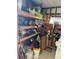 Organized shed with shelving provides plenty of storage space for tools and outdoor equipment at 188 Hibiscus Way, Leesburg, FL 34748