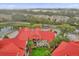 Aerial view of condo community with red roofs and lush landscaping at 216 Afton Sq # 103, Altamonte Springs, FL 32714