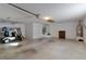 Spacious garage with a golf cart, offering ample room for vehicles and storage at 2507 Caribe Dr, The Villages, FL 32162