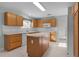 Efficient kitchen with an island and lots of cabinet space at 2507 Caribe Dr, The Villages, FL 32162