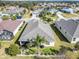 Aerial view showcasing the home's backyard and surrounding neighborhood at 26637 Otter Creek Ln, Leesburg, FL 34748