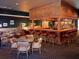 Upscale bar with wood finishes and comfortable seating at 26637 Otter Creek Ln, Leesburg, FL 34748