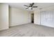 Spacious bedroom with ceiling fan and carpet at 30138 Losino Cv, Mount Dora, FL 32757