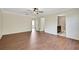 Large bedroom with wood floors and ensuite bathroom access at 30138 Losino Cv, Mount Dora, FL 32757