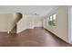 Spacious living room with hardwood floors and large windows at 30138 Losino Cv, Mount Dora, FL 32757