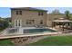 Inviting pool with patio furniture, gazebo, and lush landscaping at 30138 Losino Cv, Mount Dora, FL 32757