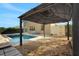 Inviting pool with gazebo and lush landscaping at 30138 Losino Cv, Mount Dora, FL 32757