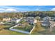 Aerial view of community with pool at 3463 Creek Run Ln, Eustis, FL 32736