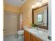 Bathroom with shower/tub combo and wood vanity at 3463 Creek Run Ln, Eustis, FL 32736