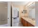 Double vanity bathroom with neutral tones and a shower/tub combo at 3463 Creek Run Ln, Eustis, FL 32736