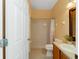 Bathroom with shower/tub combo, vanity, and a decorative mirror at 3463 Creek Run Ln, Eustis, FL 32736