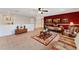 Bright bonus room with a daybed, comfortable seating, and accent wall at 3463 Creek Run Ln, Eustis, FL 32736
